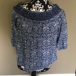 Blue and white patterned blouse